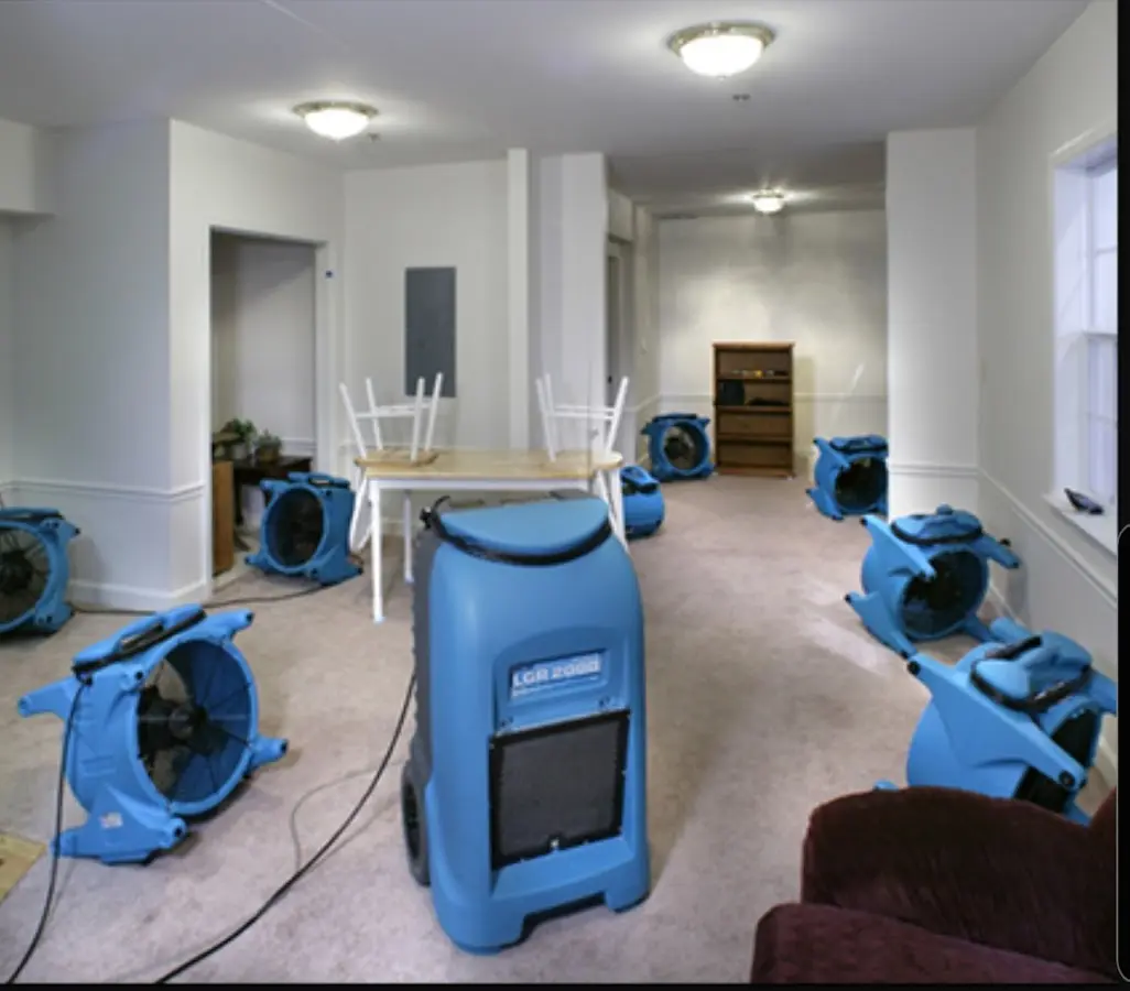Air movers and dehumidifier setup for Water Damage Restoration in Parole